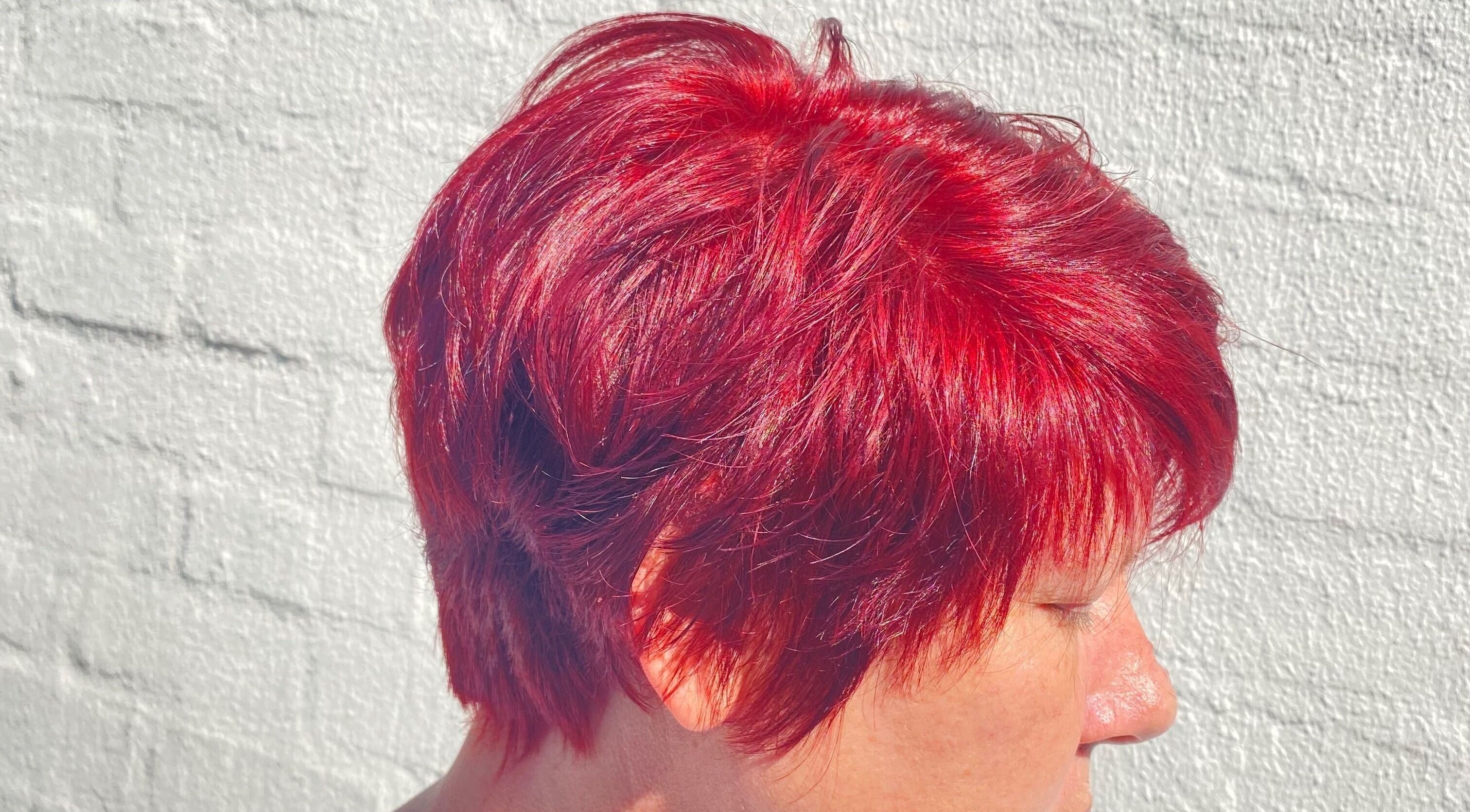 Vibrant red hair styling at Ilze at Makeup Madonna, Wellington, Western Cape, ZA.