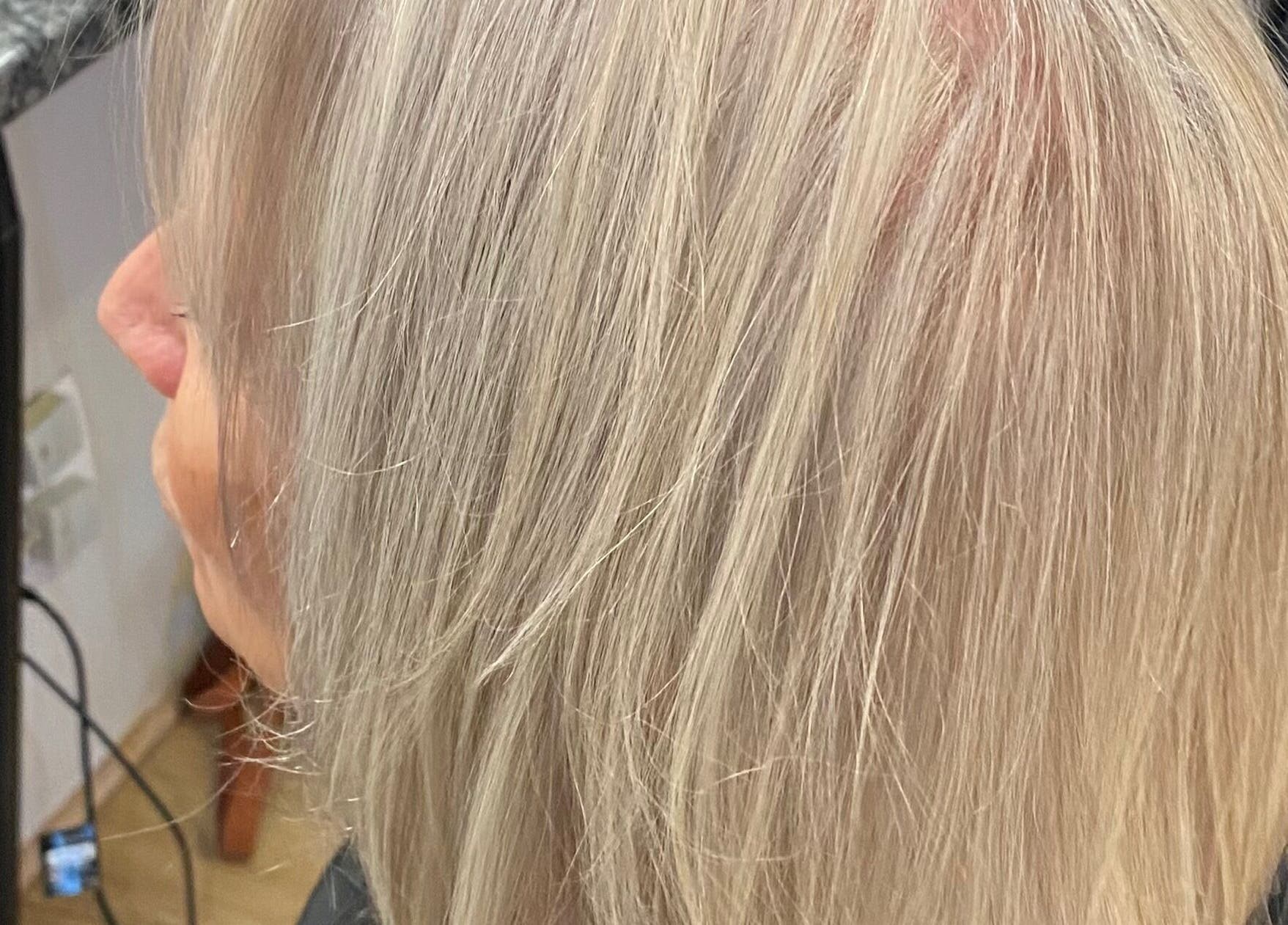 Close-up of a sleek, blonde haircut at Ilze at Makeup Madonna, Wellington, Western Cape, ZA.