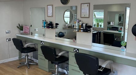 Modern styling stations at Polgooth Village Salon in Polgooth, England, GB showcasing sleek design and equipment.