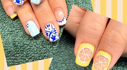 Vibrant nail art with lemon and floral designs at Polgooth Village Salon, Polgooth, England, GB.