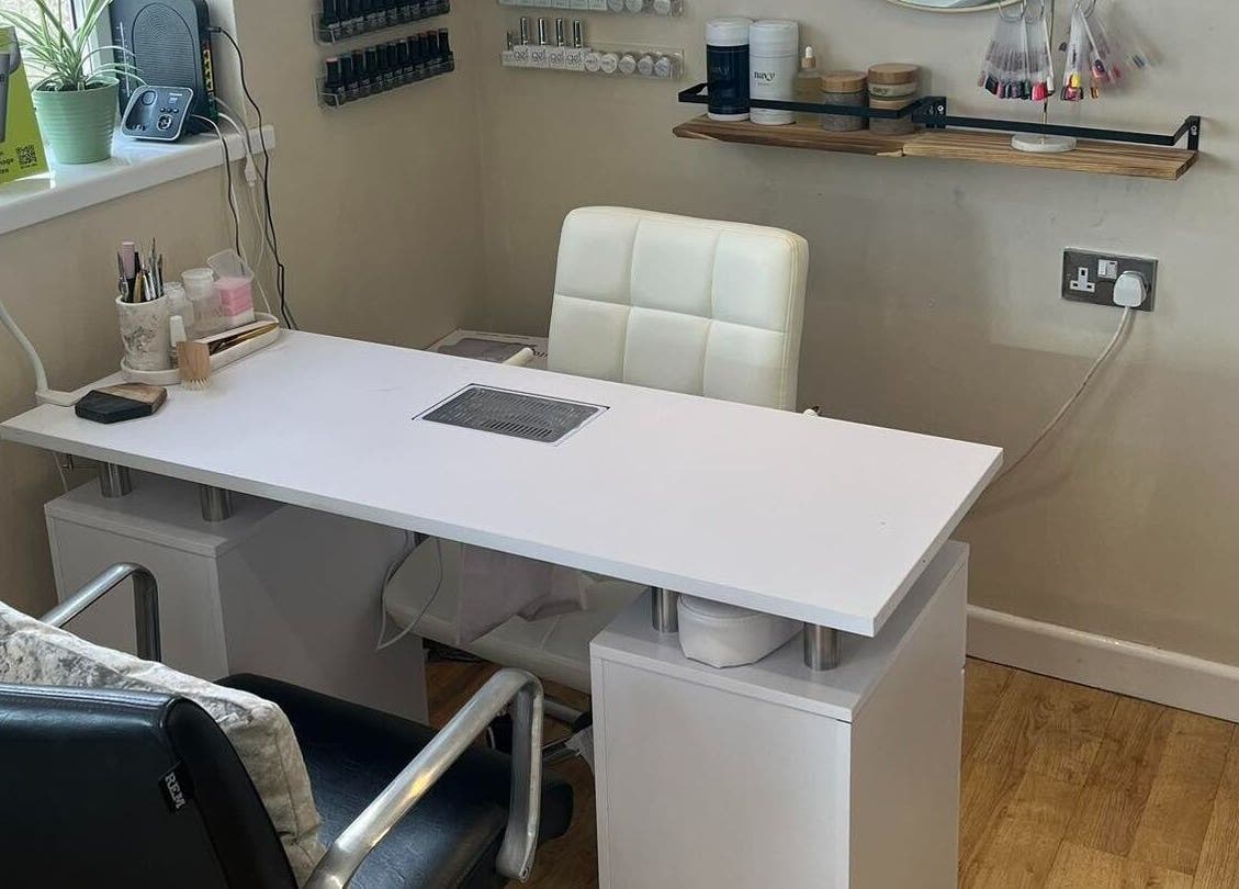 Modern nail station at Polgooth Village Salon in Polgooth, England, GB with sleek design and organized tools.