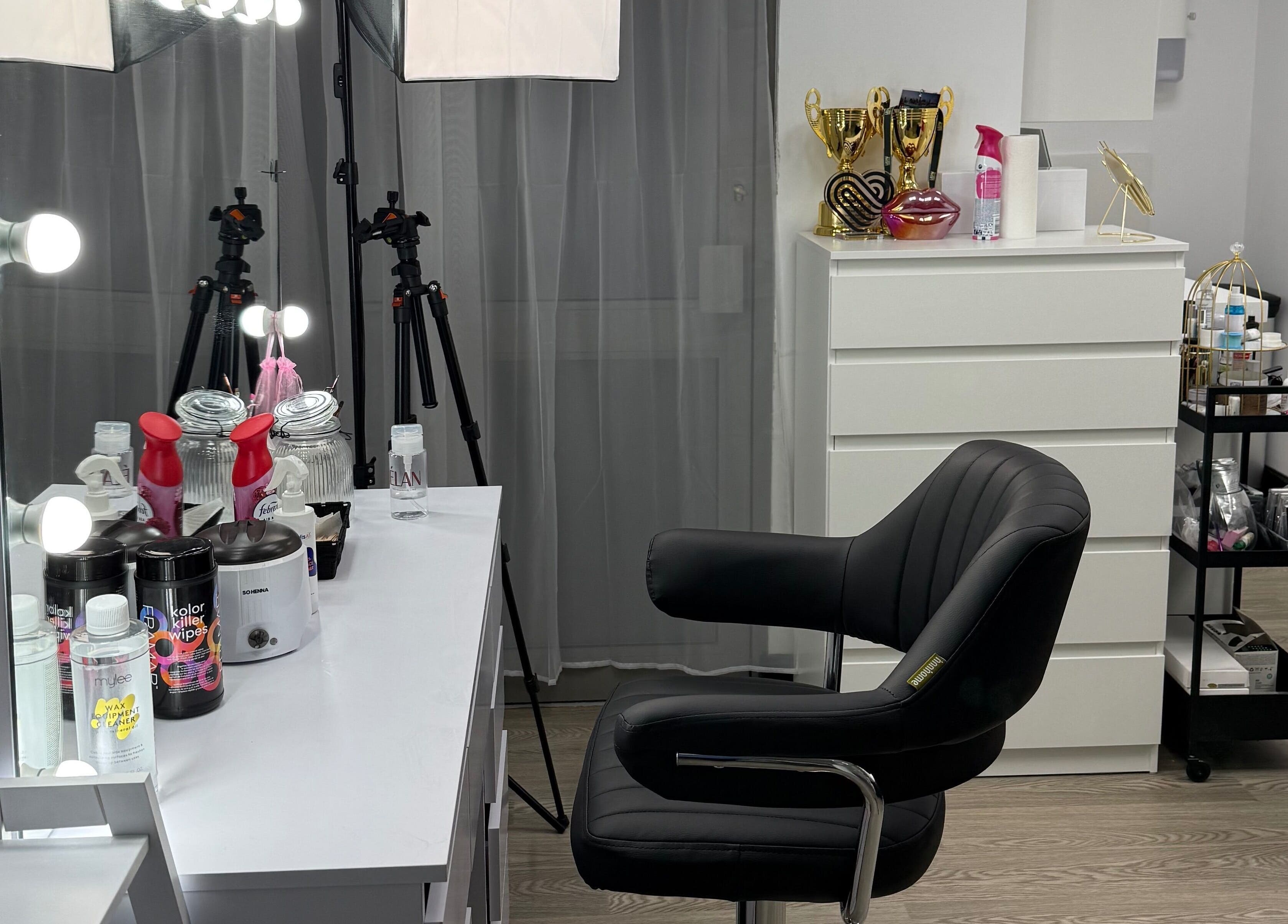 Yanaalash beauty salon in Manchester, England, GB showcasing a stylish makeup station with professional tools.