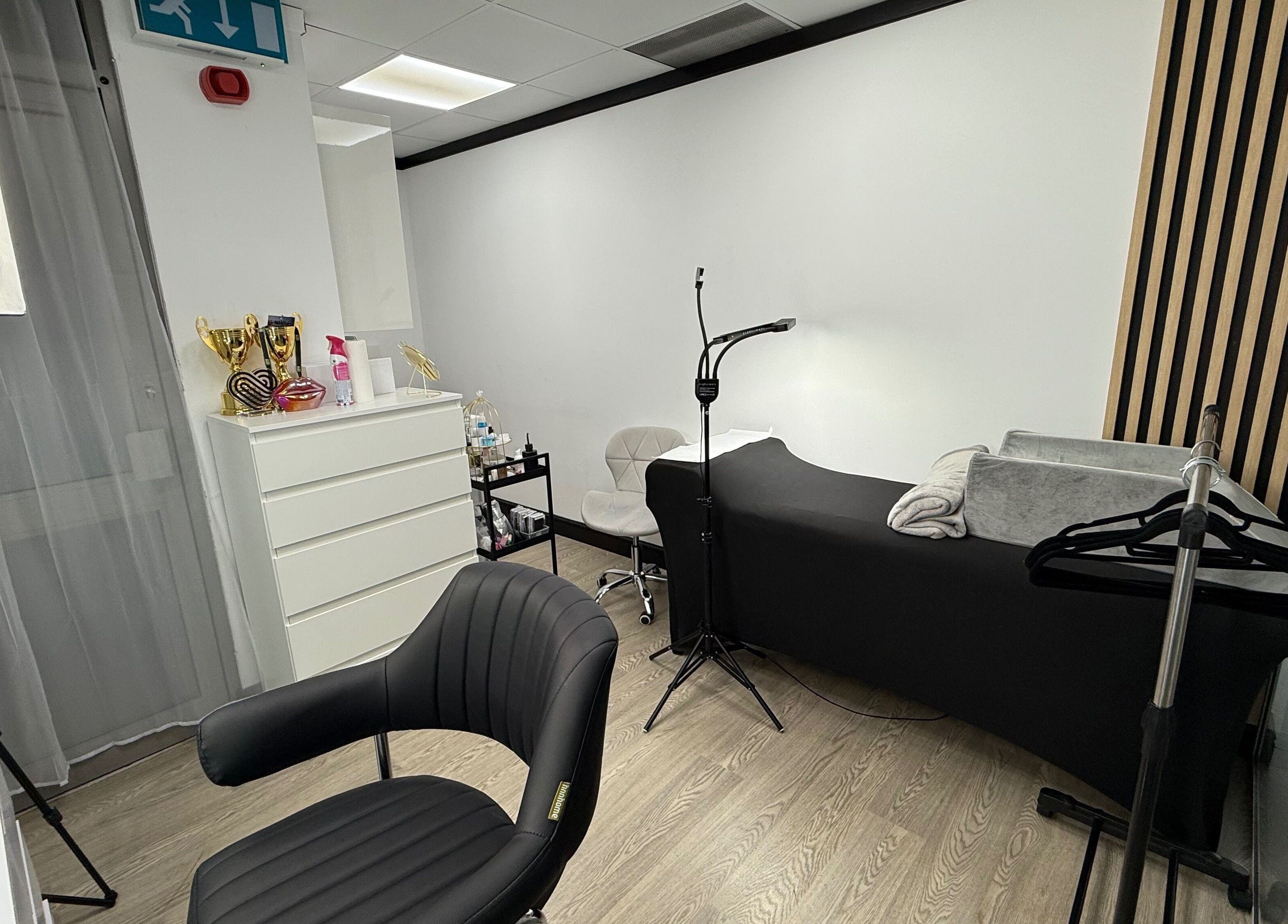 Modern salon interior at Yanaalash, Manchester, England, GB with chic decor and professional tools.