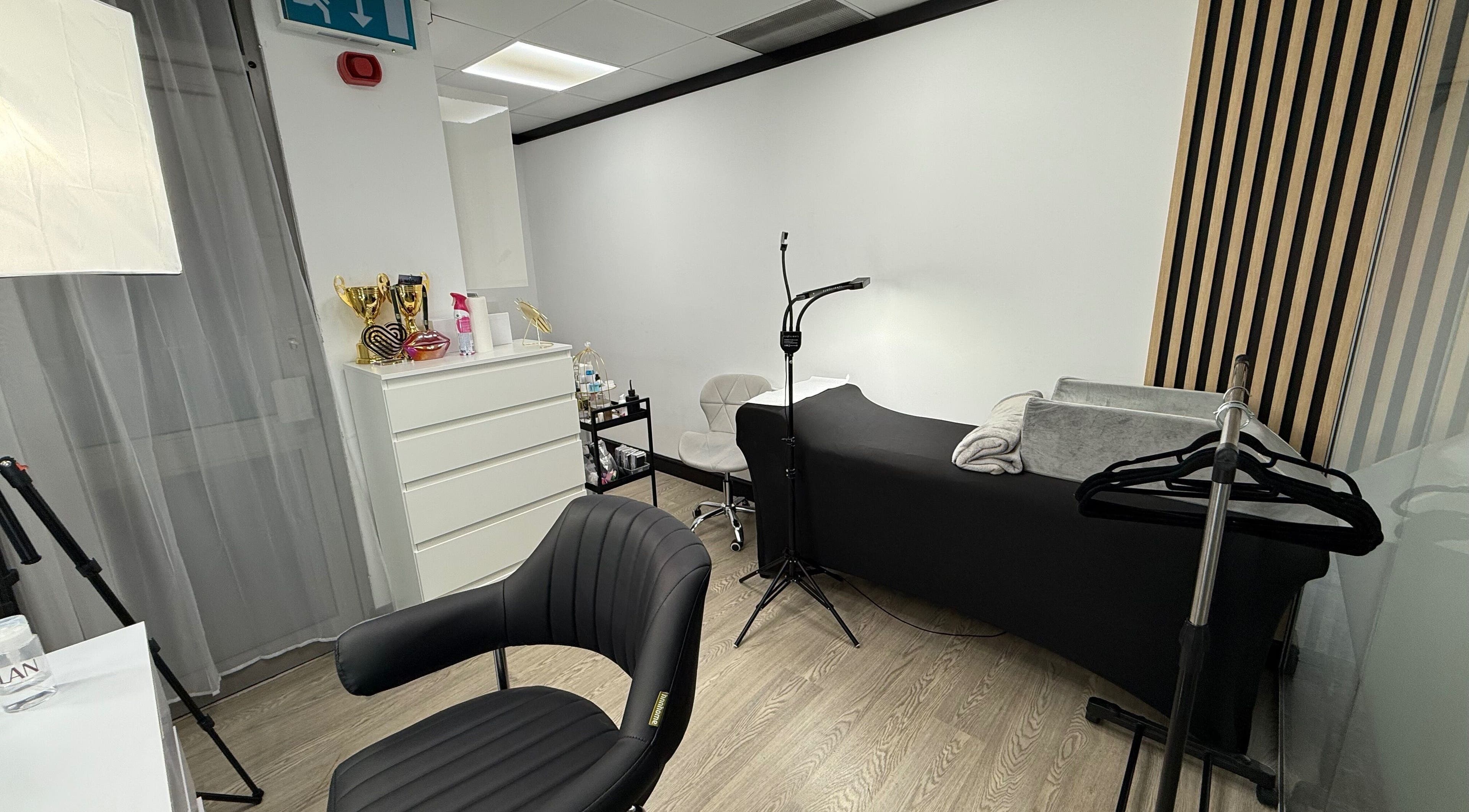 Modern salon interior at Yanaalash, Manchester, England, GB with chic decor and professional tools.