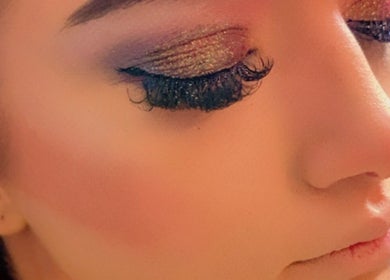 Close-up of glittery eye makeup at Ruby’s Beauty Room, Birmingham, England, GB.