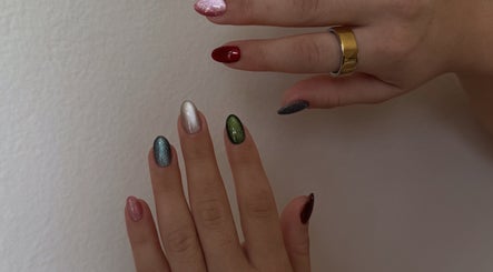 Colorful nail art at POSHROOM in Sabana Seca, Toa Baja, PR showcasing vibrant and trendy manicure styles.
