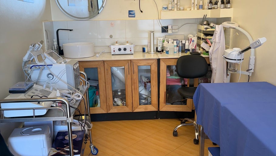 Dermacure Skincare Studio treatment room in Kira Town, Central Region, UG with modern skincare equipment.