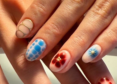 Intricate nail art at Juicy Jels, Melbourne, Victoria, AU showcasing vibrant designs and expert craftsmanship.