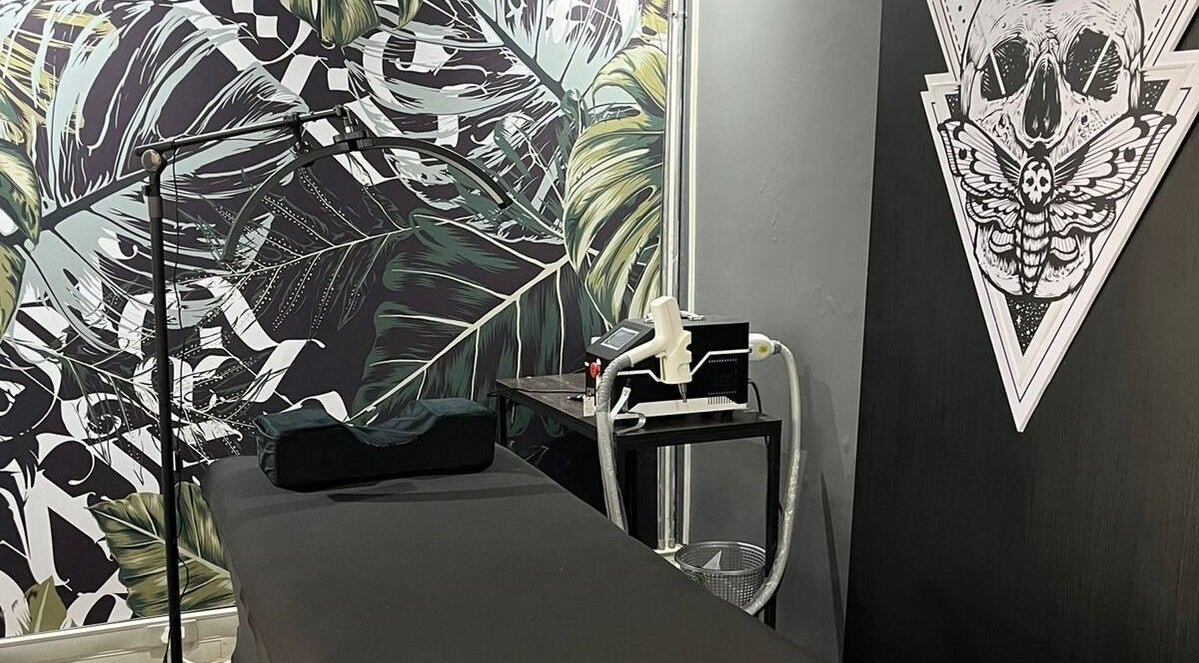 Tattoo station at Sally Mustang Tattoos Cape Town with artistic decor in Cape Town, Western Cape, ZA.