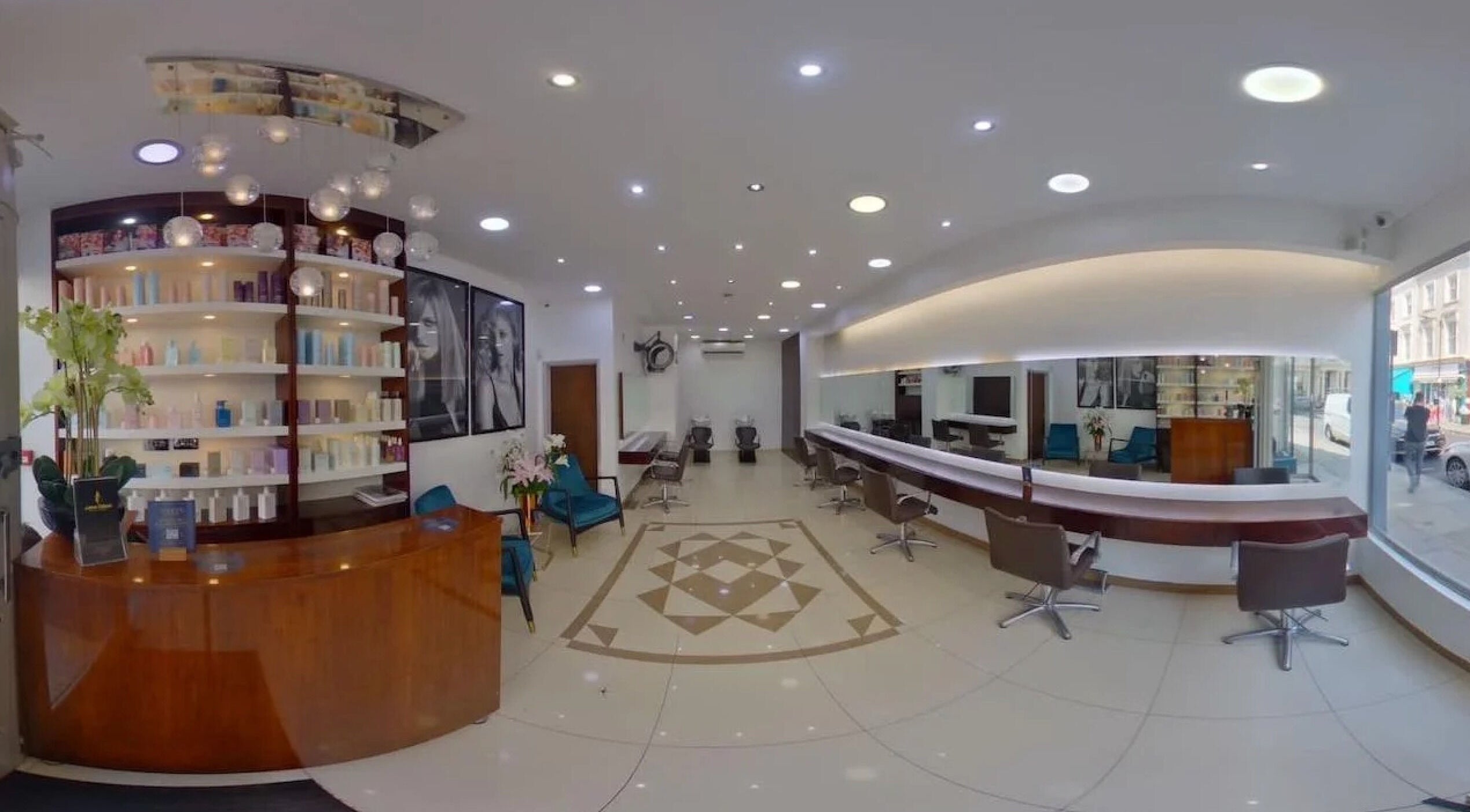 Interior of Sixty8 Hair Atelier in London, England, GB showcasing modern decor and salon chairs.