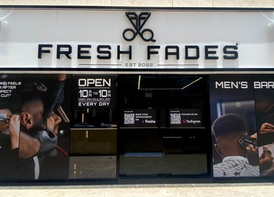 Exterior of Fresh Fades Mens Barbershop in Dubai, Dubai, AE featuring signage and barber pole.