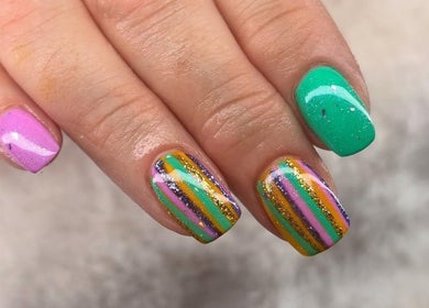 Vibrant nail art at Jessica Bentley Beauty in Brough, England. Colorful, stylish manicure showcasing creativity.
