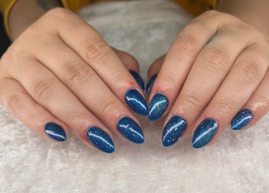 Elegant blue gel nails at Jessica Bentley Beauty, Brough, England. Perfect for a chic look.