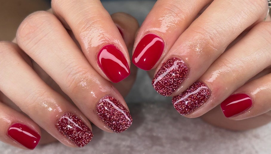 Red and glitter nails at Jessica Bentley Beauty, Brough, England, GB; beauty and style showcase.