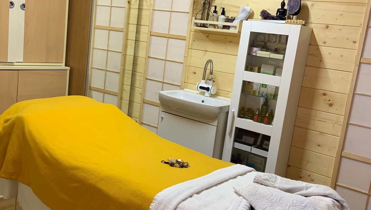 Serene treatment room with yellow blanket in Southampton SO19 9JR, Southampton, England, GB.