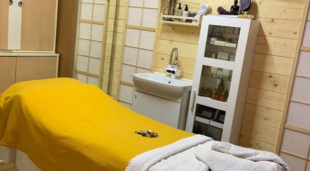 Serene treatment room with yellow blanket in Southampton SO19 9JR, Southampton, England, GB.