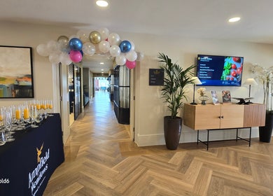 Bright entryway of Elements Of Zen in Chandler's Ford, England, GB, adorned with balloons and elegant decor.