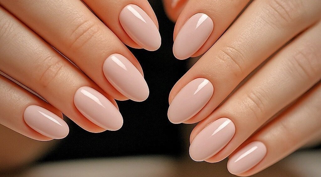Elegant soft pink manicured nails at Nel Nails, Aughnacloy, Northern Ireland, GB, showcasing timeless style.