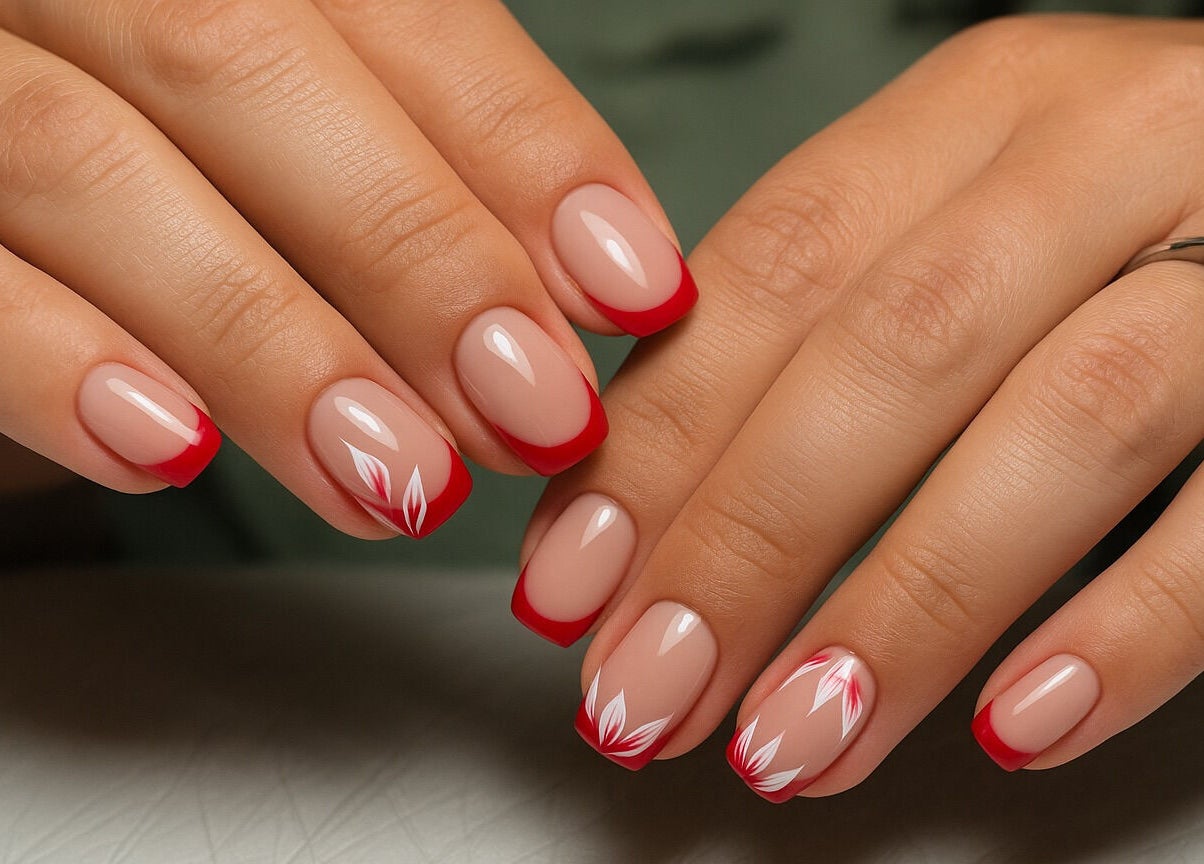 Elegant floral red-tipped manicure at Nel Nails, Aughnacloy, Northern Ireland, GB.