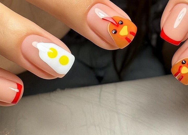Whimsical chicken nail art at Nel Nails, Aughnacloy, Northern Ireland, GB. Vibrant and fun manicure design.