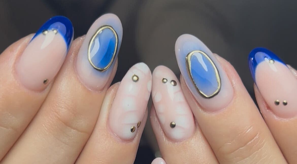 Stylish nail art with blue and gold accents by Nails by Jen, St Helens, England, GB.