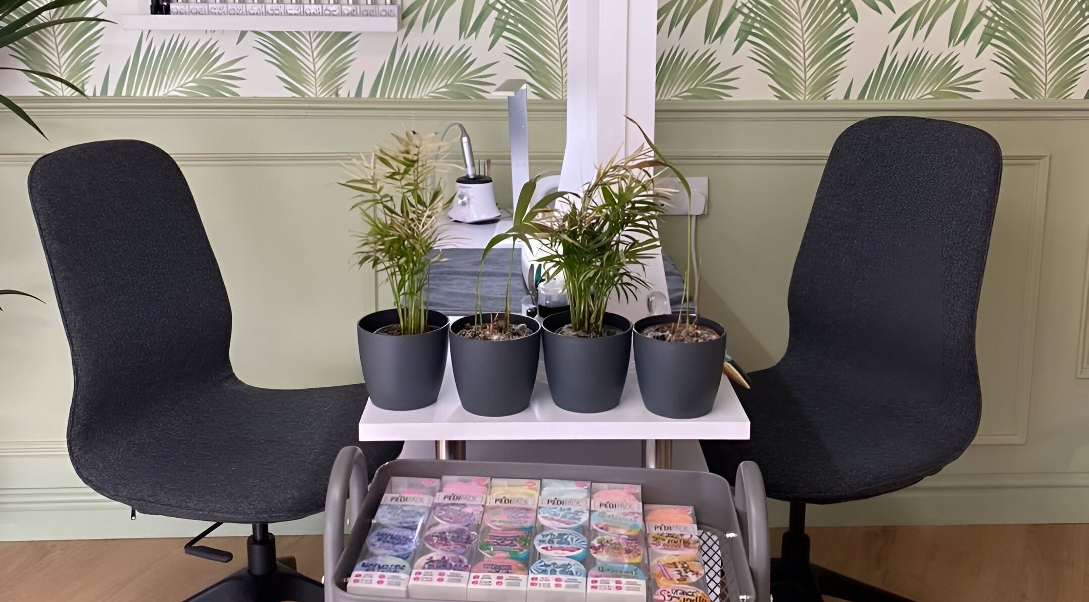 Stylish seating with plants at Belle Ame West Kirby, West Kirby, England, GB, blends comfort and nature beautifully.