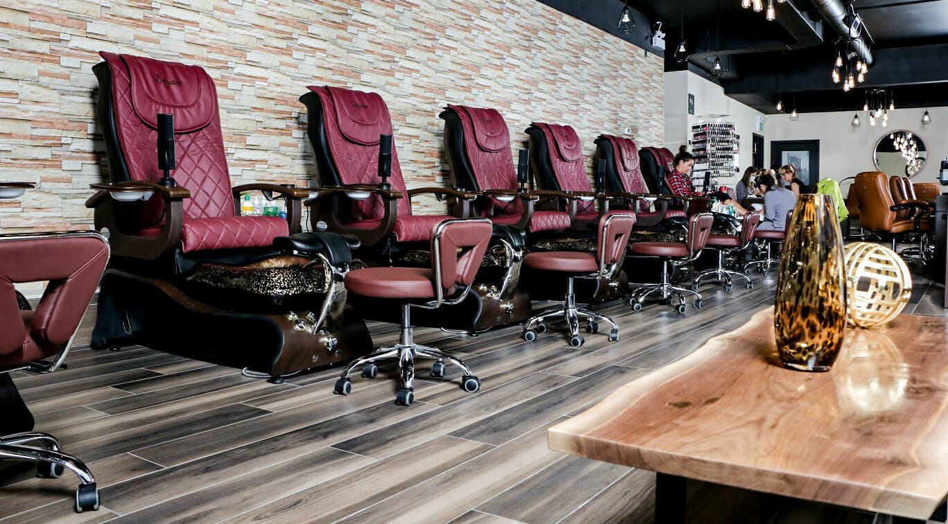 Luxurious pedicure chairs at Elegant Nails and Spa, London, Ontario, CA. Relaxing ambiance for premium nail care.