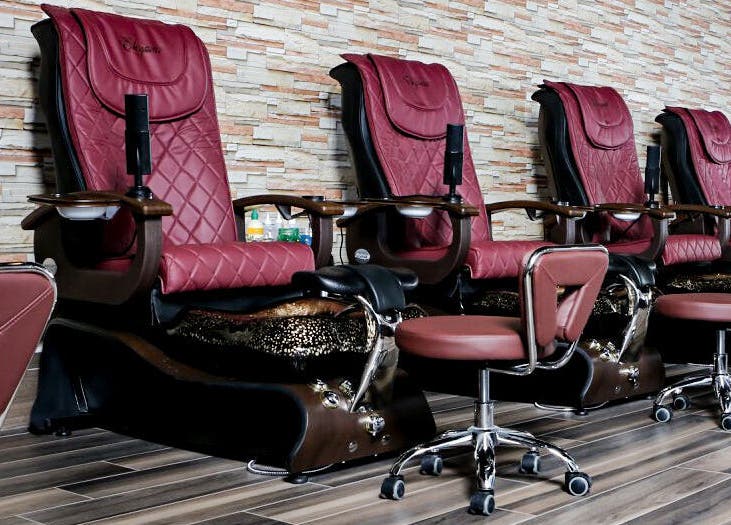 Plush pedicure chairs at Elegant Nails and Spa in London, Ontario, CA, ready for a relaxing experience.