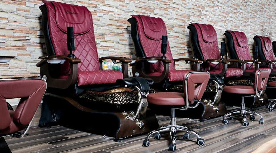 Plush pedicure chairs at Elegant Nails and Spa in London, Ontario, CA, ready for a relaxing experience.