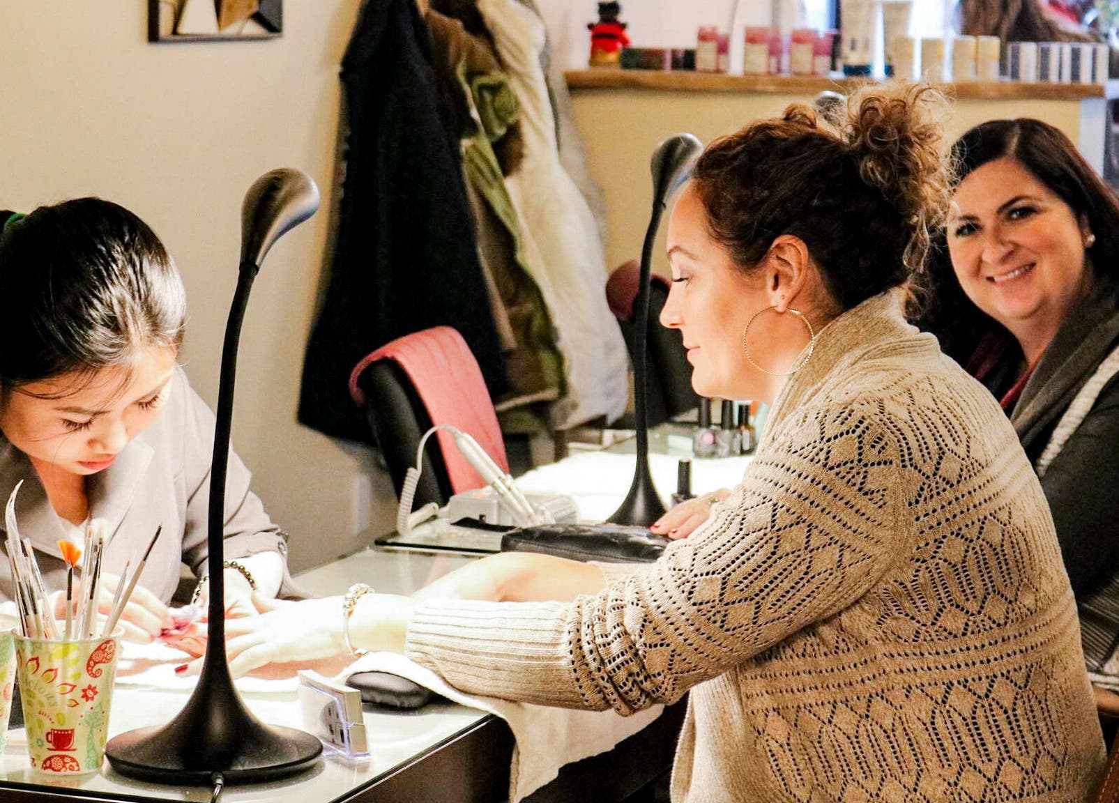 Professional nail care at Elegant Nails and Spa in London, Ontario, CA with attentive staff providing services.