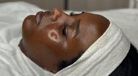 Relaxed facial treatment at By Beauty Academy, Manchester, England, GB, showcasing glowing skin.