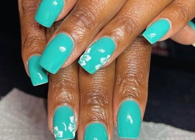 Elegant aqua nail art at Glamfair Beauty Bar, Randburg, Gauteng, ZA showcasing floral accents.
