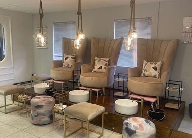 Luxurious pedicure chairs at Black Bird Beauty Spa, Roodepoort, Gauteng, ZA showcasing modern comfort and style.