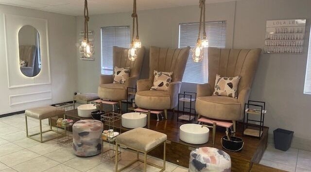 Luxurious pedicure chairs at Black Bird Beauty Spa, Roodepoort, Gauteng, ZA showcasing modern comfort and style.