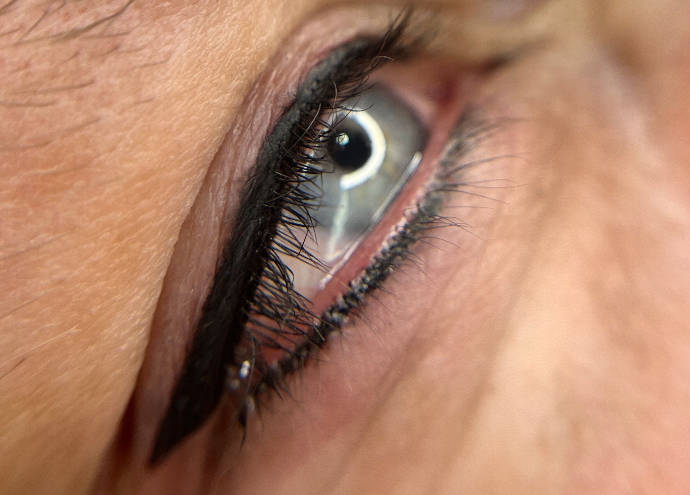 Closeup of a beautifully lined eye, showcasing eyeliner expertise at Scalpture Ink, Johannesburg, Gauteng, ZA.