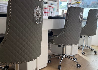 Plush salon chairs at Kaites Nails, Twickenham, England, GB create a stylish nail service atmosphere.