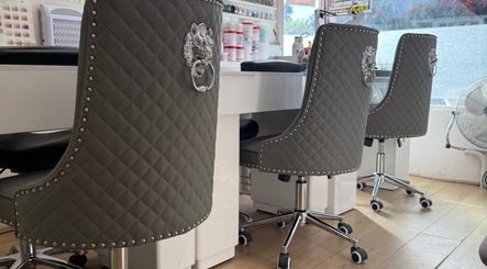 Plush salon chairs at Kaites Nails, Twickenham, England, GB create a stylish nail service atmosphere.