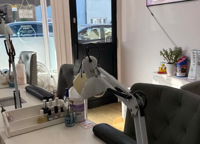 Elegant interior of Kaites Nails in Twickenham, England, GB, featuring a modern nail station setup.