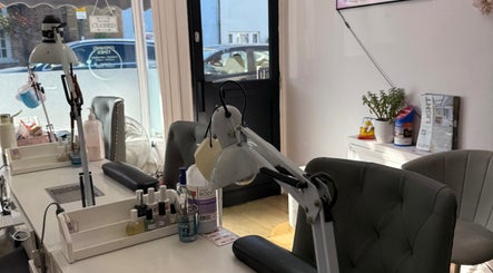 Elegant interior of Kaites Nails in Twickenham, England, GB, featuring a modern nail station setup.