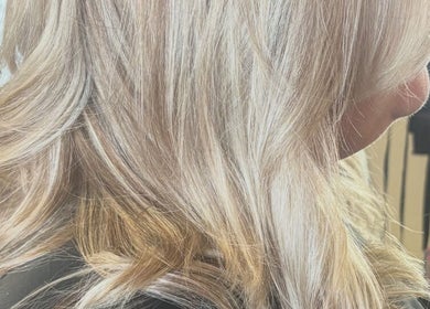 Elegant blonde waves styled at Zolot Hairdressing in Scotland, Scotland, GB.