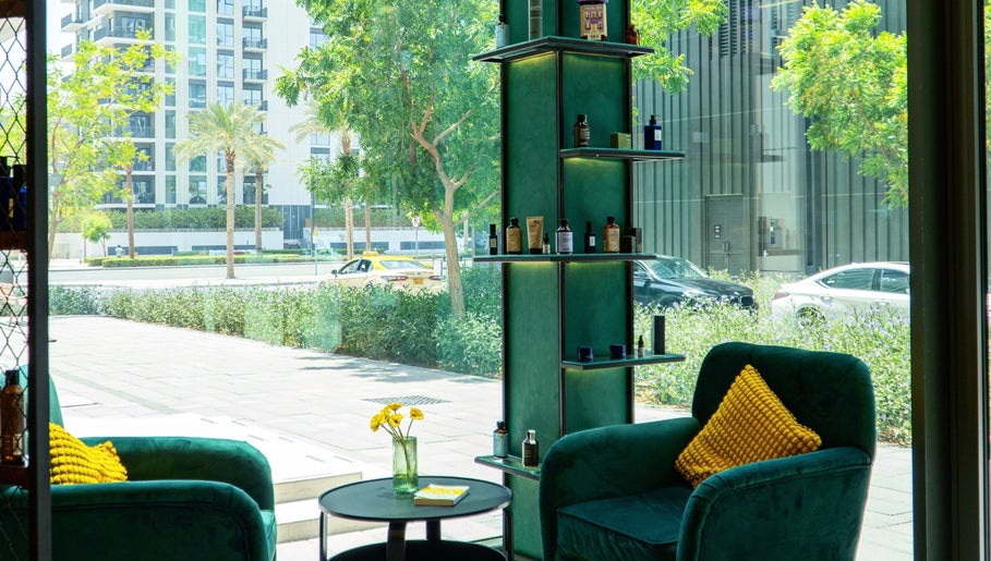Cozy, sunlit lounge area at 717 Gents Salon | Dubai Hills, offering a serene view of Dubai, Dubai, AE.