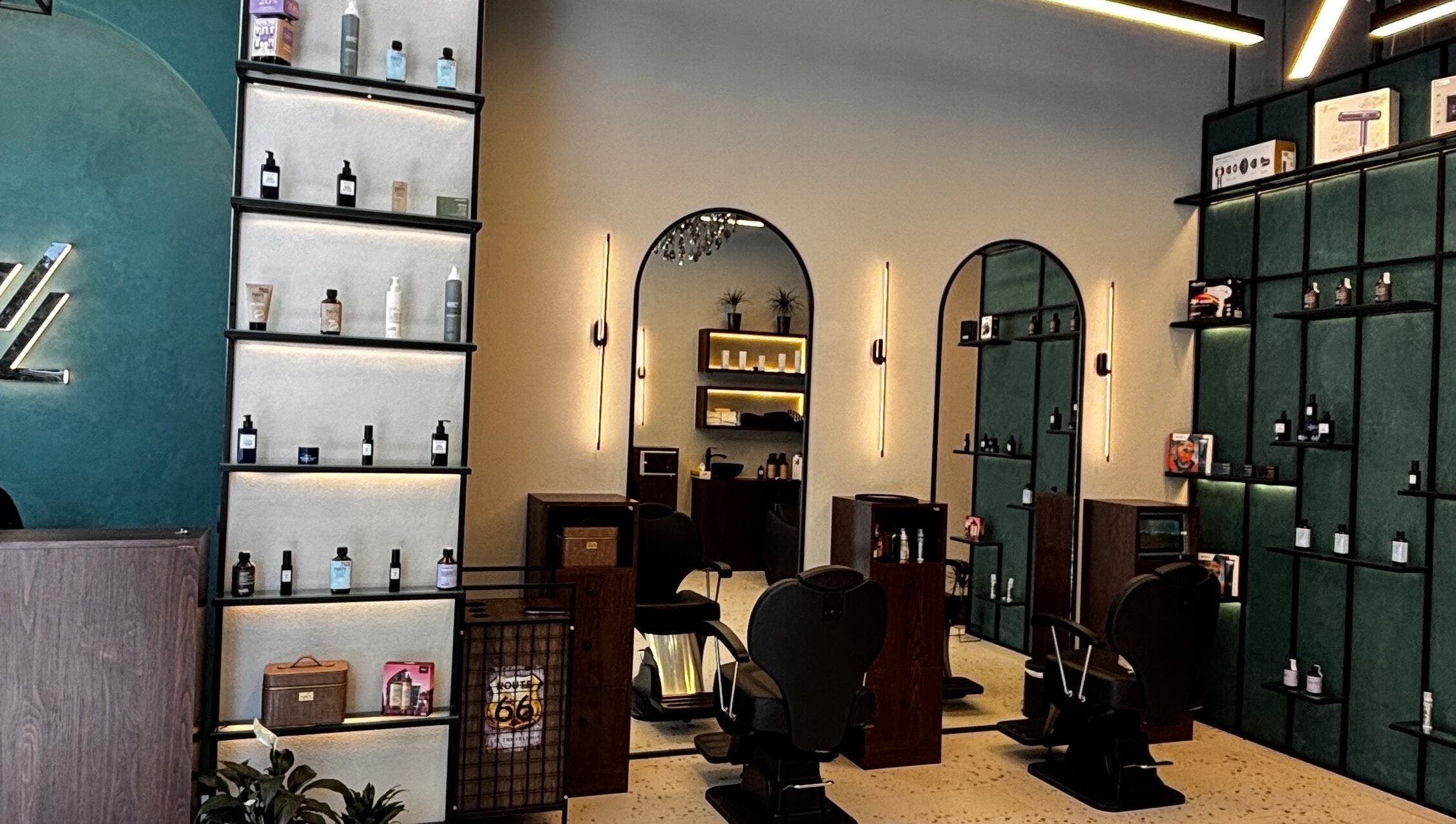 Interior of 717 Gents Salon | Dubai Hills in Dubai, Dubai, AE showcasing modern styling chairs and product displays.