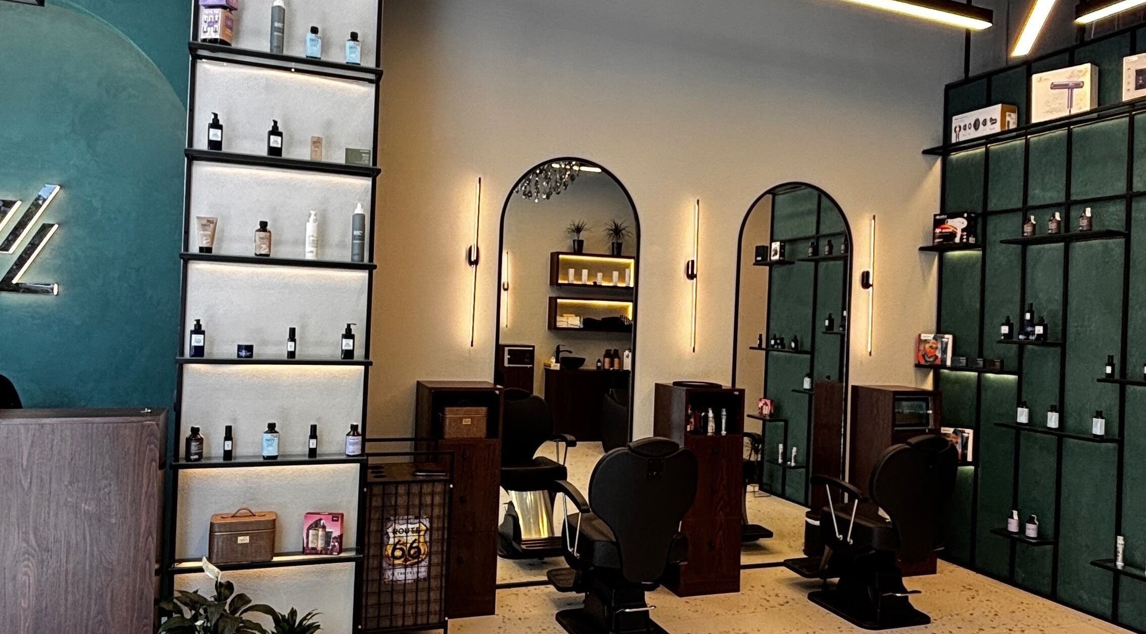 Interior of 717 Gents Salon | Dubai Hills in Dubai, Dubai, AE showcasing modern styling chairs and product displays.