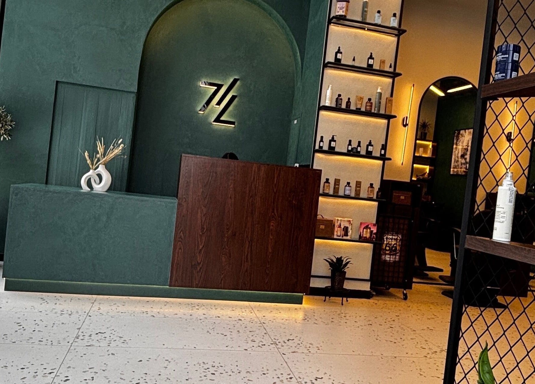 Explore the chic interior of 717 Gents Salon | Dubai Hills, located in Dubai, Dubai, AE, featuring modern decor.