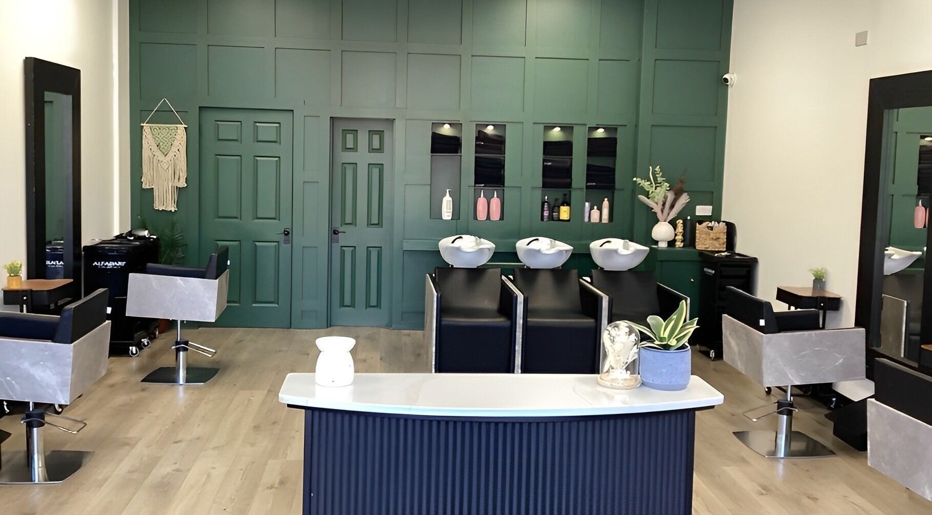 Interior of Bella Vida Hair Salon in County Laois, IE showcasing modern styling chairs and elegant decor.
