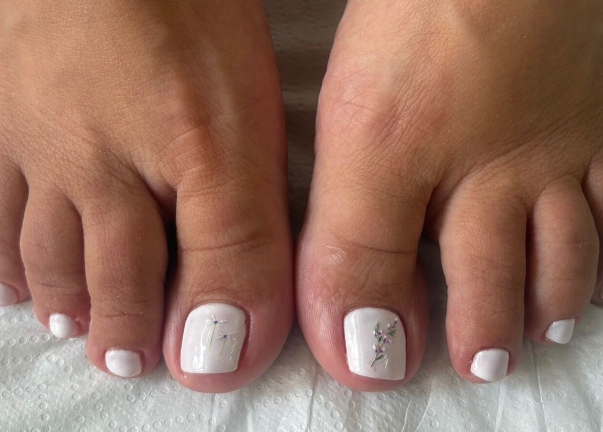 Chic pedicure with delicate white polish at Kim’s Beauty Center in Iż-żurrieq, MT.