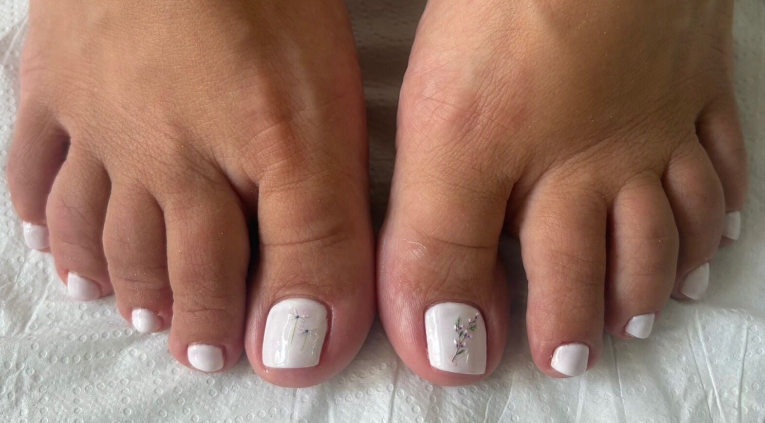 Chic pedicure with delicate white polish at Kim’s Beauty Center in Iż-żurrieq, MT.