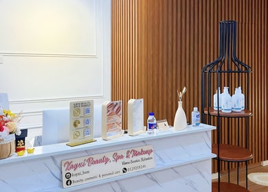 Reception area at Kayxi Beauty Spa and Makeup in Wakaf Bharu, Kelantan, MY, showcasing products and decor.