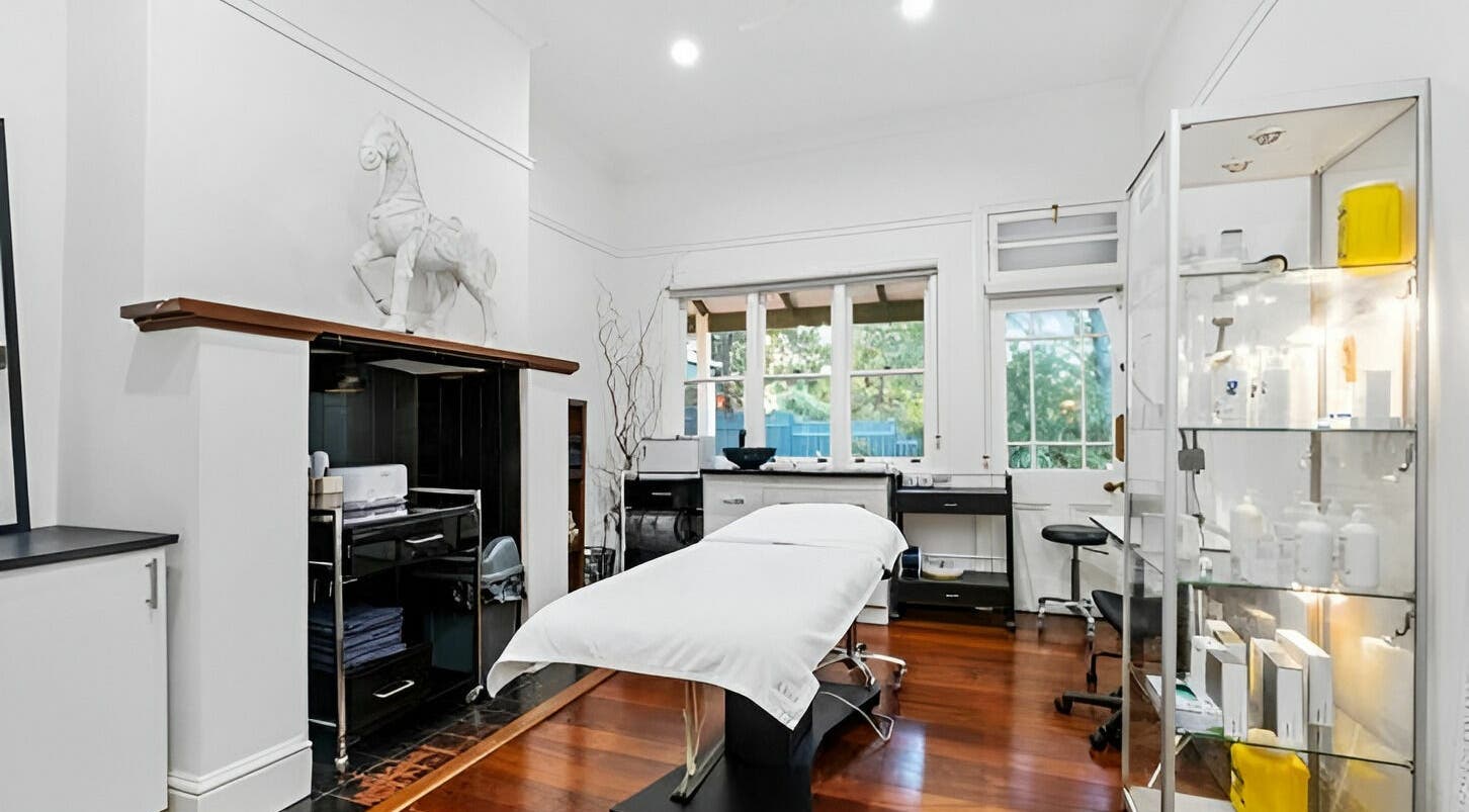 Spacious treatment room at The Beauté Collective in Midland, Western Australia featuring modern decor.