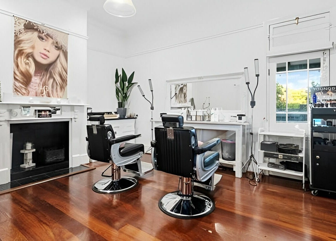 Contemporary salon at The Beauté Collective, Midland, Western Australia, AU with chic styling stations.